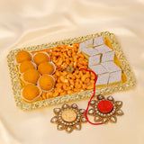 Ganesha Rakhi with Sweets and Dry Fruit Thali