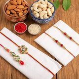 Set Of 4 Kundan Rakhi With Dry Fruits Potli