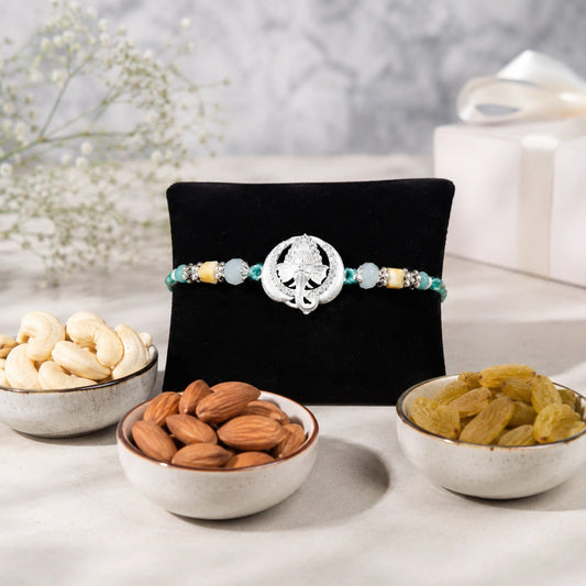 Silver Ganesh Rakhi with Dry Fruits