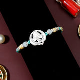 Silver Ganesh Rakhi with Dry Fruits