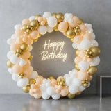 Golden Ring Balloon Arch with Neon Birthday Sign