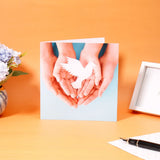 Pack of 50 Dove in Hands Greeting Card