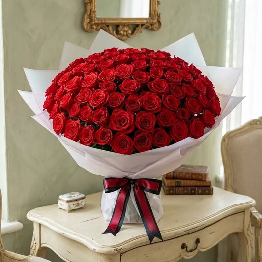 Grand 100 Red Roses Bouquet in White Premium Paper
