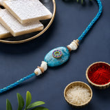 Blue Stone Floral Enamel Rakhi with Kaju Katli