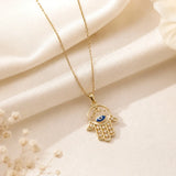 Gold-Toned Hamsa Evil Eye Necklace, Earrings and Pearl Bracelet Set