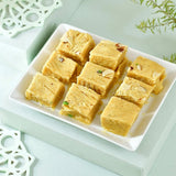 Blissful Rakhi Hamper with Soan Papdi, Ferrero Rocher, Lindt Extra Creamy Chocolate Bar, Almond, Cashew & Pistachio