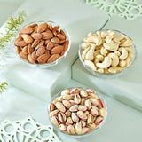Blissful Rakhi Hamper with Soan Papdi, Ferrero Rocher, Lindt Extra Creamy Chocolate Bar, Almond, Cashew & Pistachio