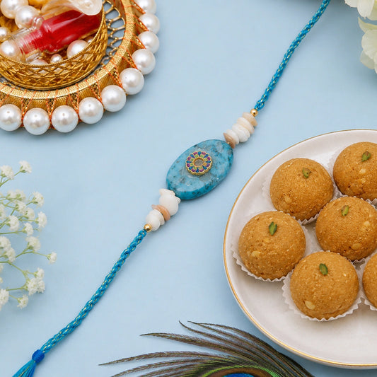 Evil Eye Pure Beads Rakhi with Besan Laddo