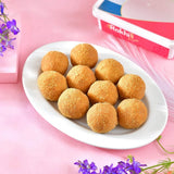 Delightful Bhai Rakhi Hamper with Besan Laddoo, Toblerone Chocolate & Almond Nuts