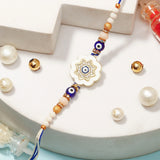 Evil Eye Flower Medallion Rakhi with Rasgulla & Dry Fruits