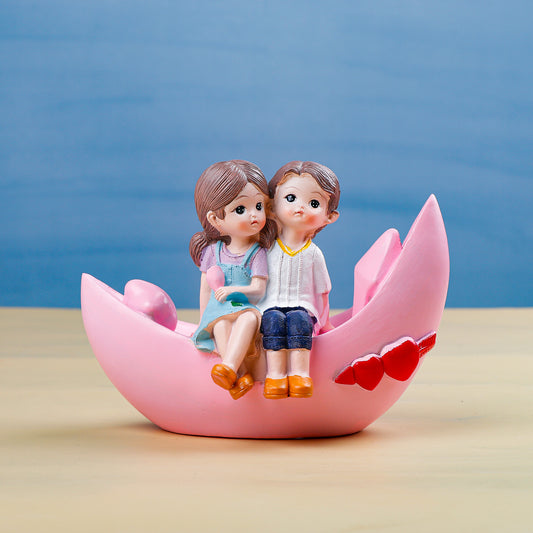 Blooming love in Boat Couple Showpiece
