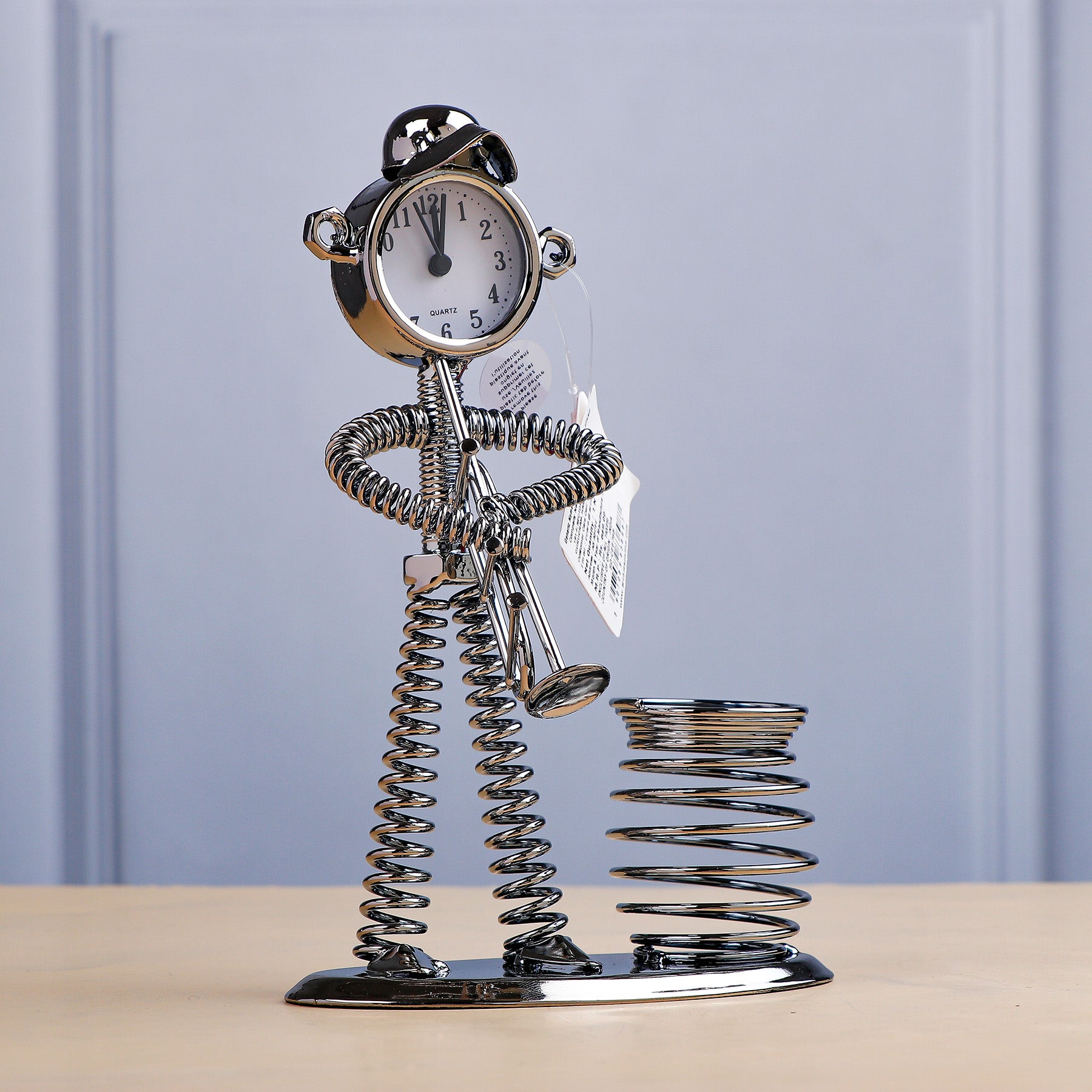 Spring Man with Instrument Clock Penstand