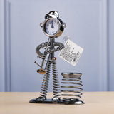 Spring Man with Instrument Clock Penstand