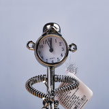 Spring Man with Instrument Clock Penstand