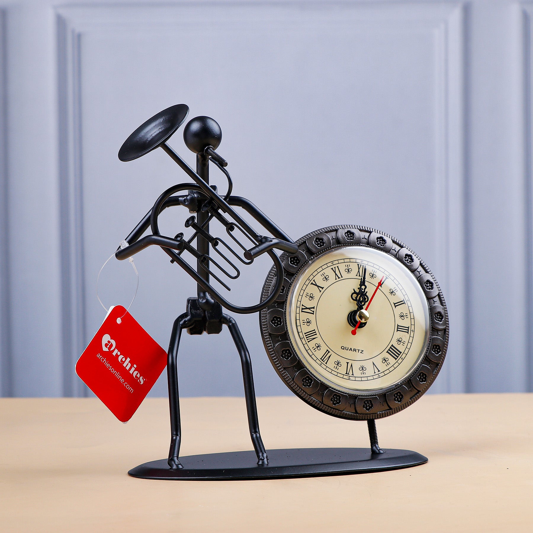 Stick man with Trumphet Clock