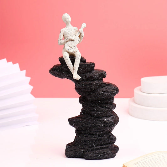 White Guitarist on Rocks Showpiece