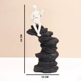 White Guitarist on Rocks Showpiece