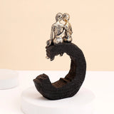 Couple on Crescent Moon Showpiece