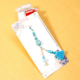 Golden Eye & Turquoise Drop Tassel Rakhi Set