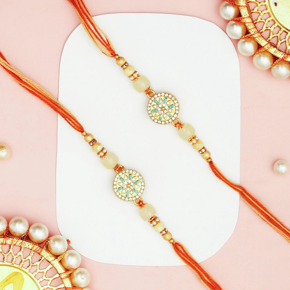 Pack Of 2 Golden Hue Spinning Rakhi