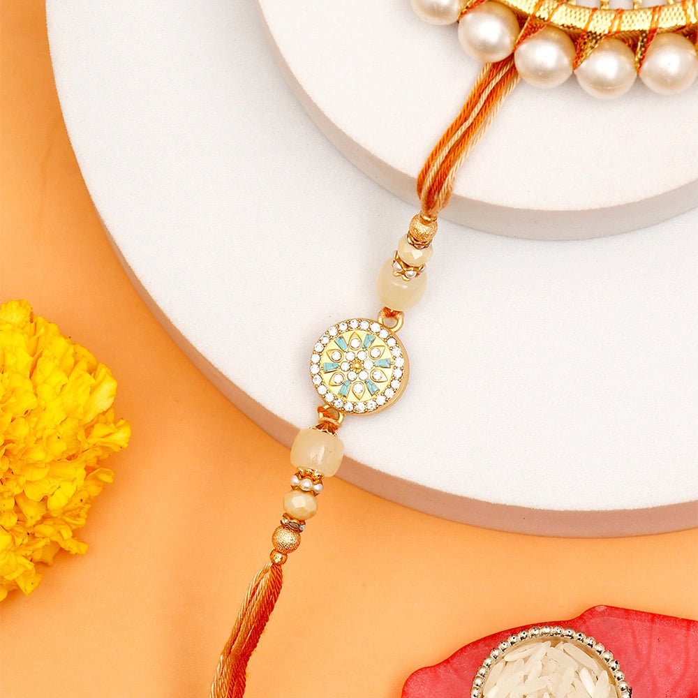 Golden Hue Spinning Rakhi