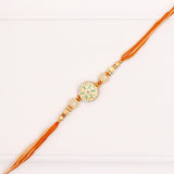 Golden Hue Spinning Rakhi