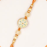 Golden Hue Spinning Rakhi