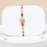 Rudraksha Mandala Charm Rakhi & Archies 01 Musk Perfume Mug Set