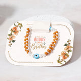 Wooden Evil Eye & Pastel Tri-Tassel Rakhi Set