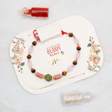 Ivory Quartet Charm Rakhi Set