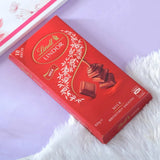 Adorned Rakhi Hamper with Lindt Milk Chocolate, Soan Papdi & Cashew Nut