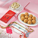 Premium Set Of 3 Bhai Rakhi Hamper with Besan Laddoo, Cashew & Lindt Lindor Milk Chocolate