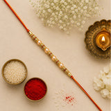 Celestial Pearl Beads Rakhi with Cadbury Chocolates | Rakhi Gift Online