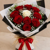 9 Red & 1 White Rose Black & White Wrap Bouquet