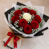 9 Red & 1 White Rose Black & White Wrap Bouquet