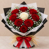 9 Red & 1 White Rose Black & White Wrap Bouquet