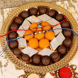 Evil Eye and Krishna Rakhi with Sweets and Chocolate Platter Set of 2