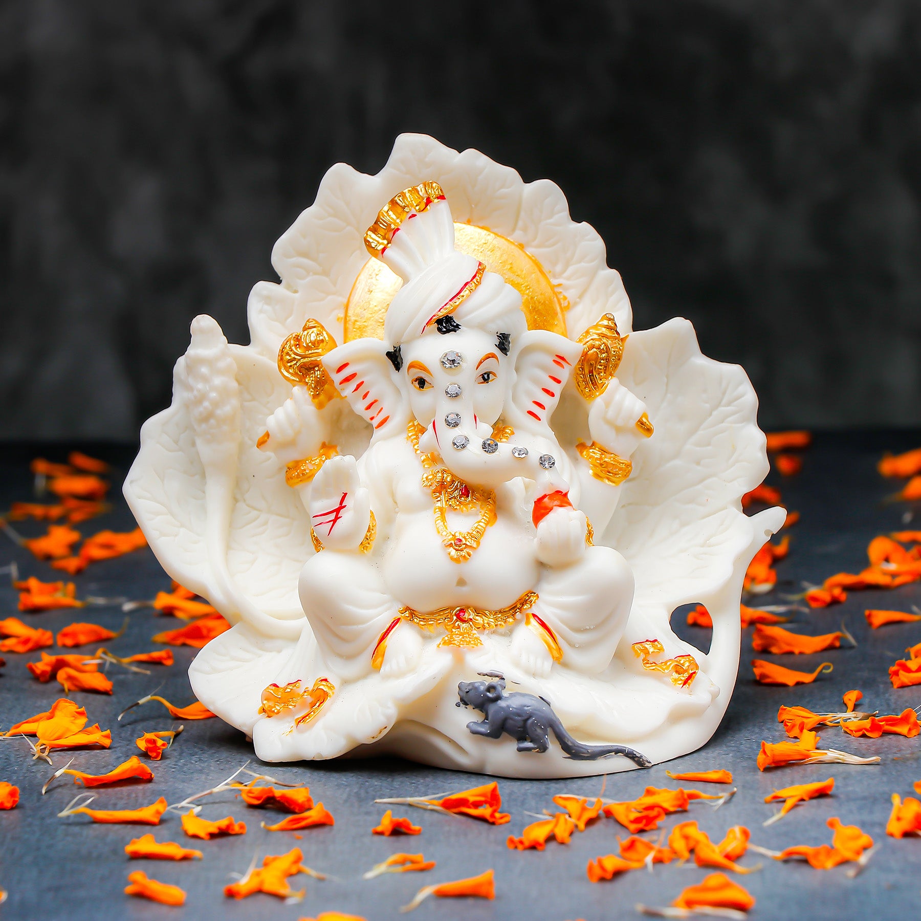 White Ganeha Idol with Golden Accents