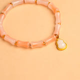 Soft Blush Golden Charm Bracelet