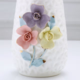 White Ceramic Vase with Embossed Flowers