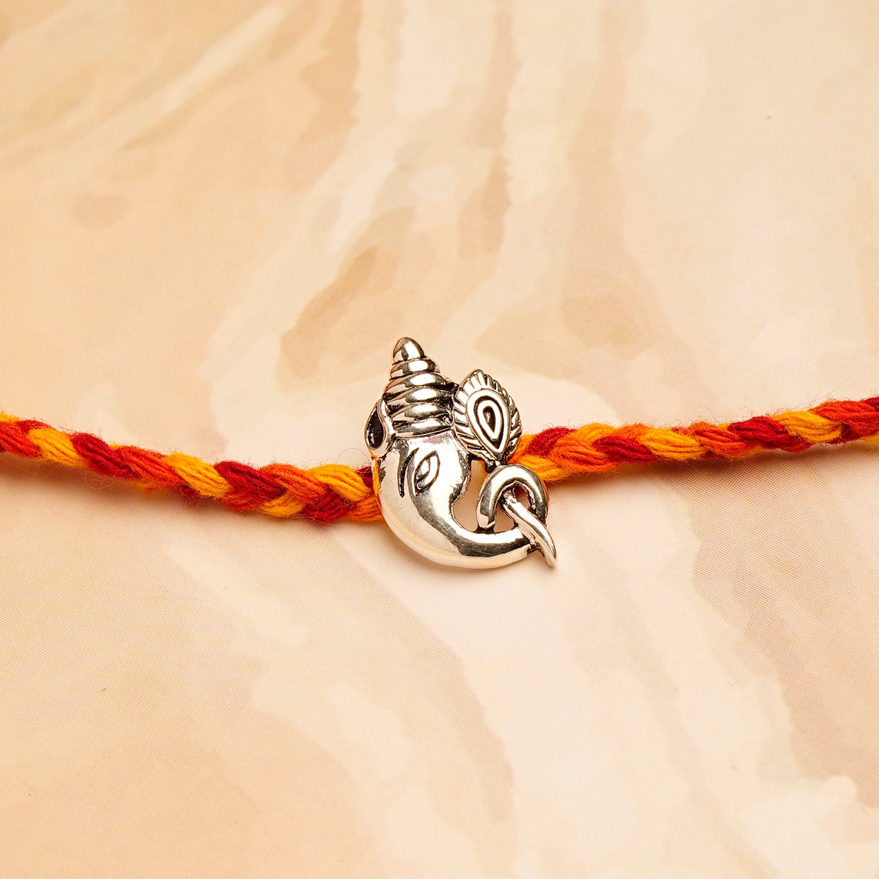 Traditional Ganesha Premium Silver Rakhi