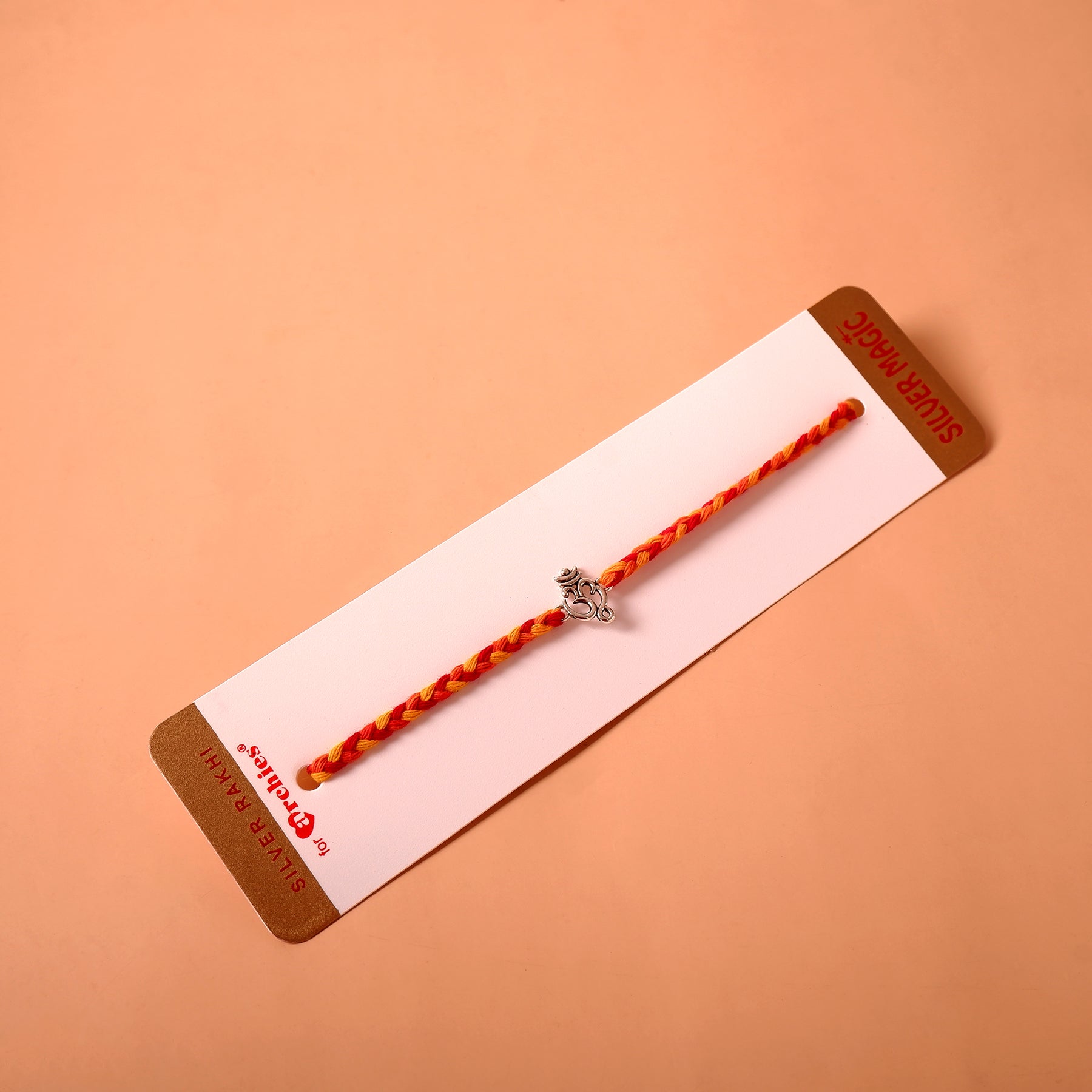Divine OM Premium Silver Rakhi