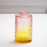 Purple Blossoms in Crystal Vase