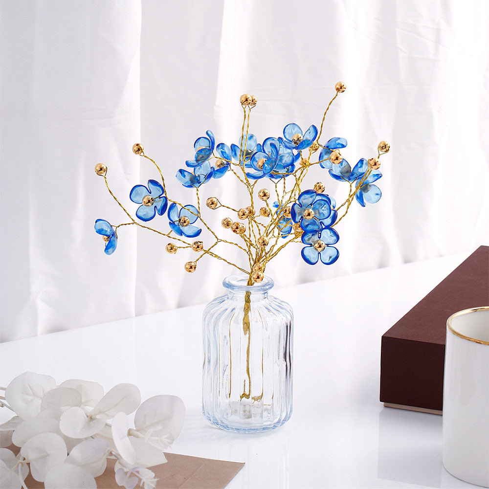 Blue Blossoms in Crystal Vase