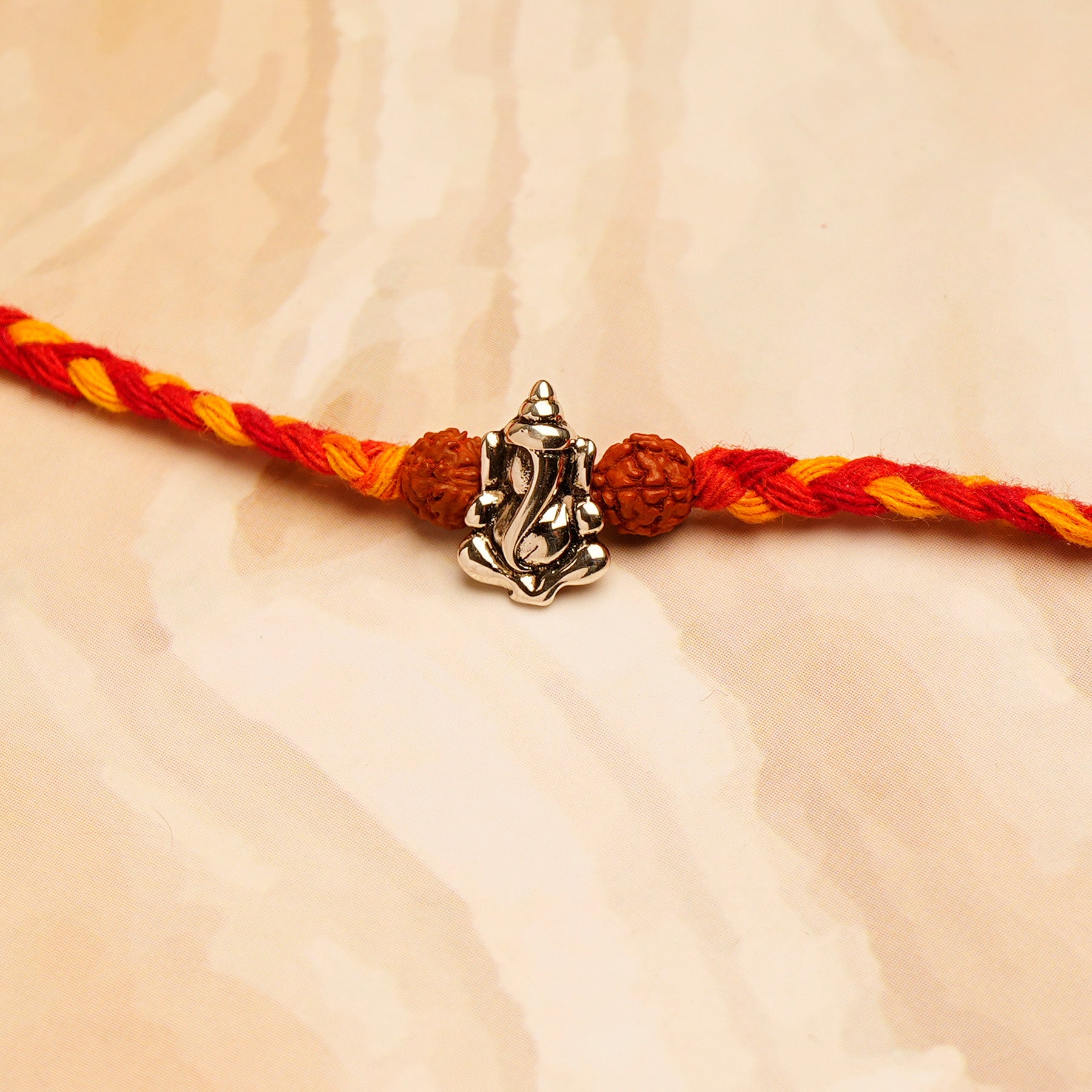 Shree Ganesha Premium Silver Rakhi