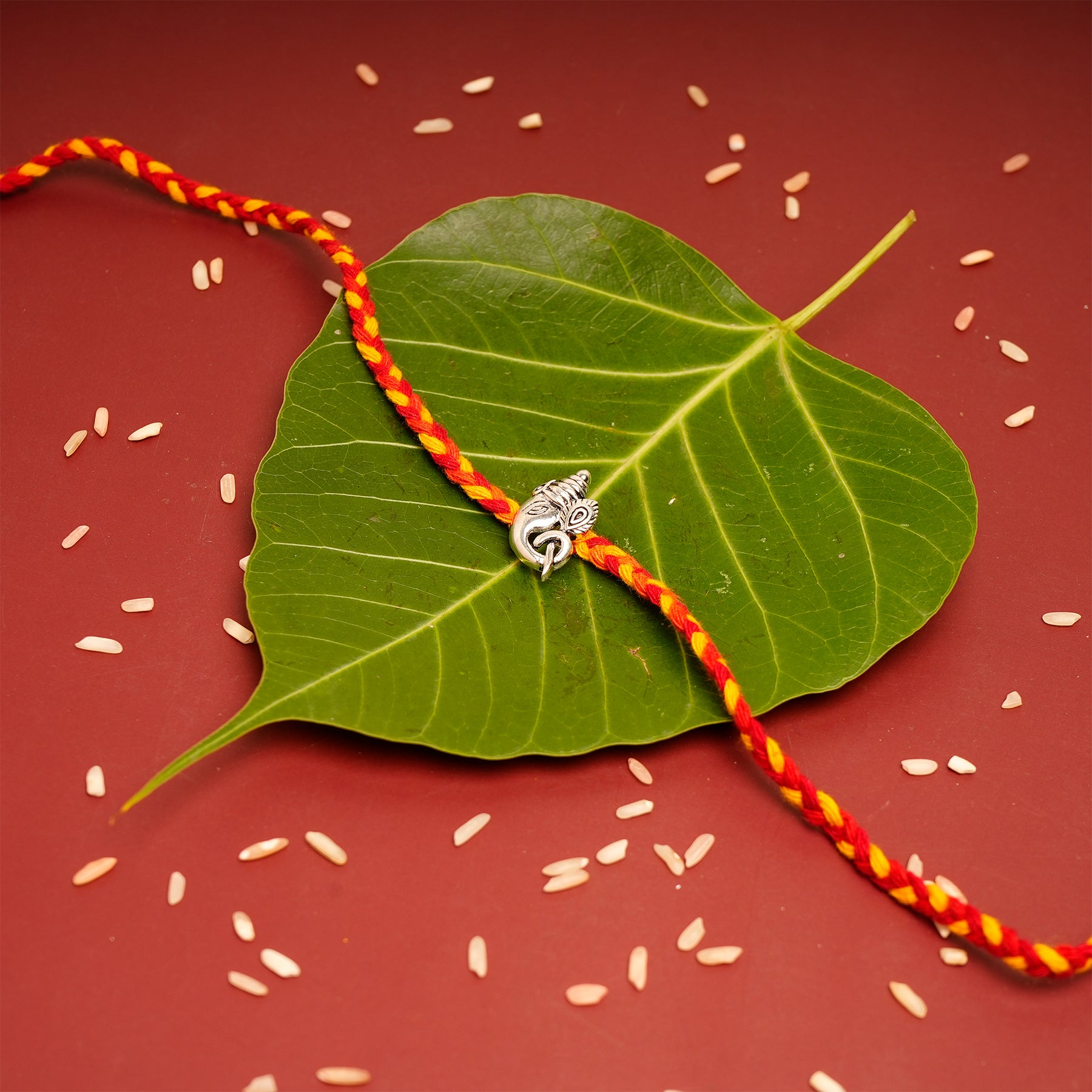 Traditional Ganesha Premium Silver Rakhi