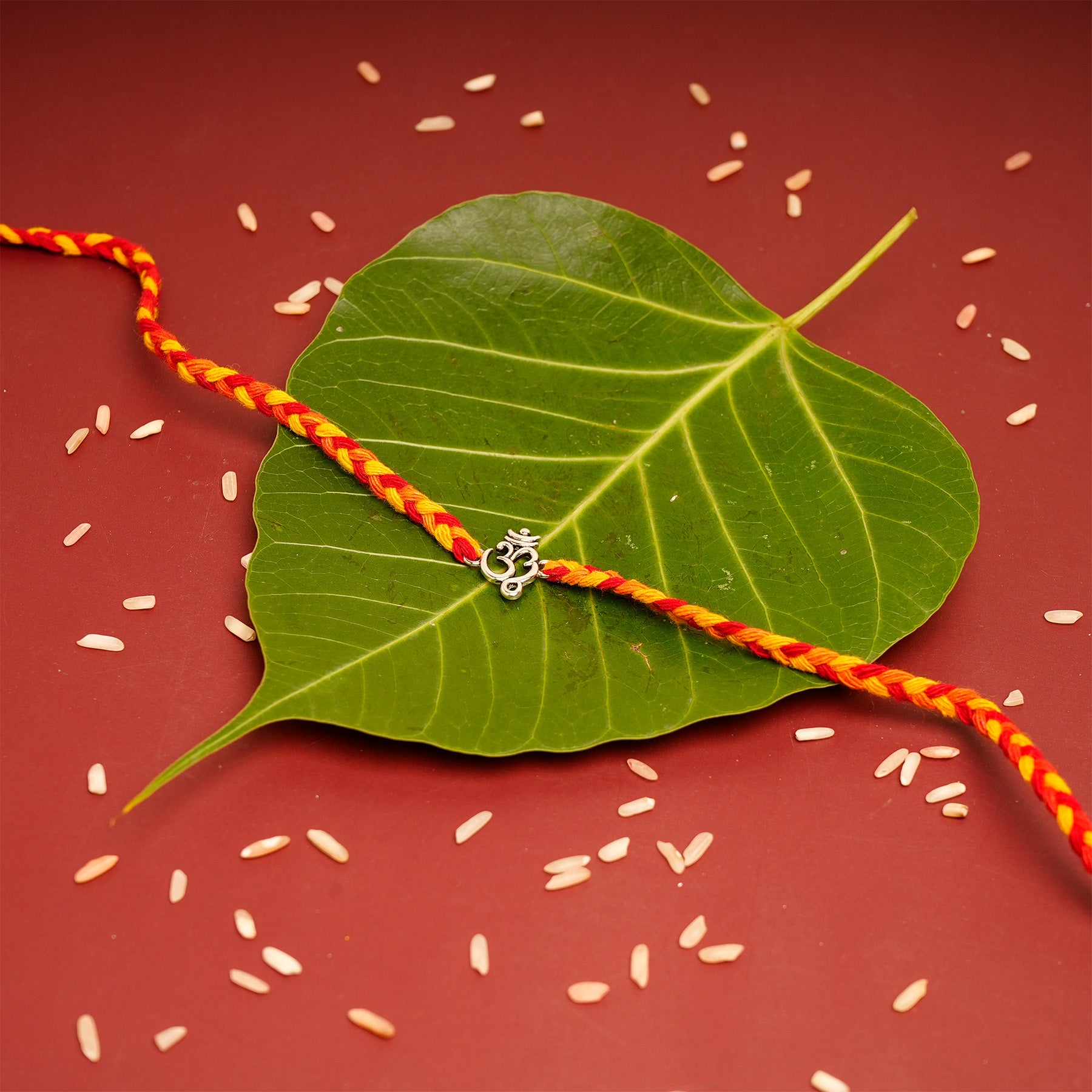 Divine OM Premium Silver Rakhi