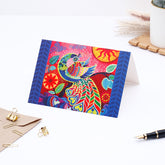Peacock Seasons Greeting Card