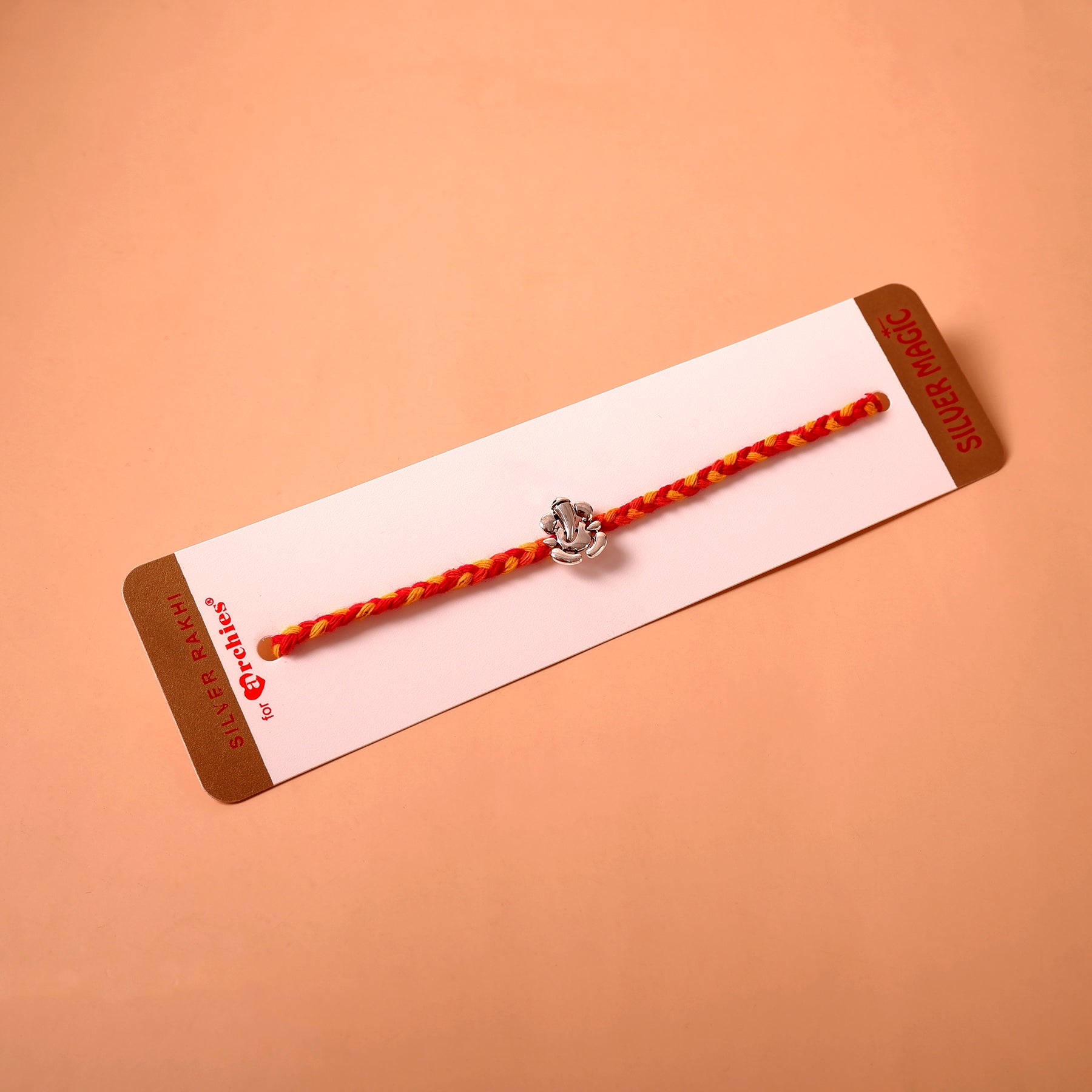 Divine Ganesha Premium Silver Rakhi