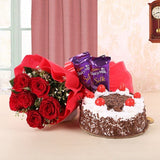 6 Red Roses- Red Paper and Red Bow- Black Forest Cake (Half Kg)- 2 Cadbury's Dairy Milk Silk (60gms each)